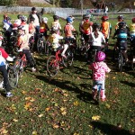 Elsie and Lily prepare for Under 12s Cyclocross